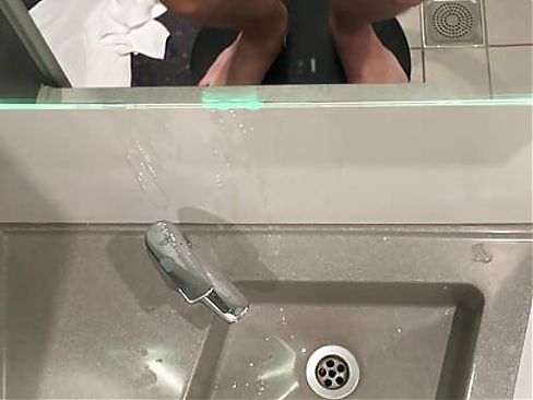 Hard and massive cumshot over the sink